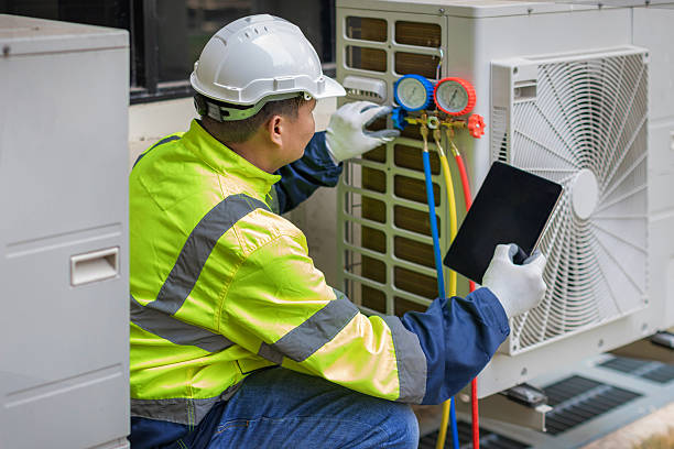 Professional Ac Installation technician working in Spring Mount, PA